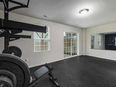 Empty, minimalist gym space with natural light.